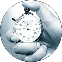 Hand holding a classic stopwatch.